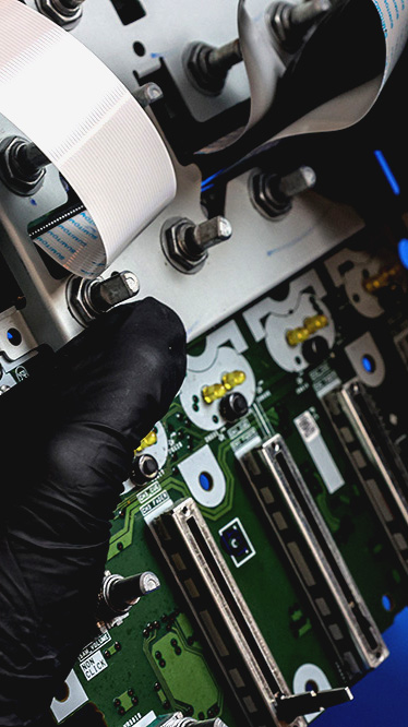Close-up of DJ equipment ports under repair